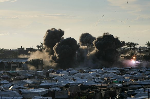 Smoke rises following an Israeli military strike on a target in Deir al-Balah, central Gaza Strip.