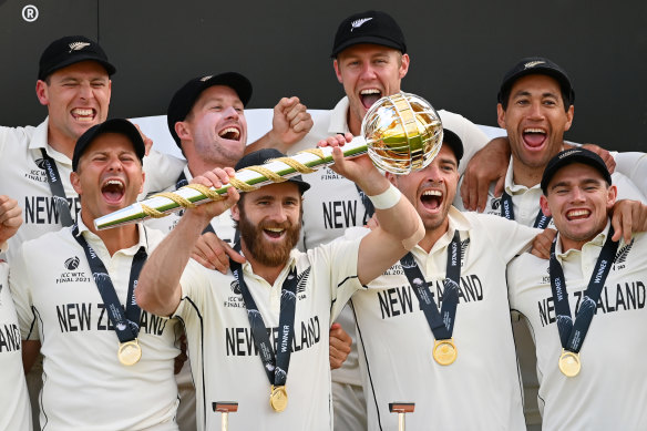 Kane Williamson holds the World Test Championship mace aloft.