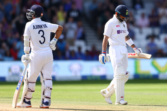 Virat Kohli heads back to the pavillion after being caught by Joe Root.