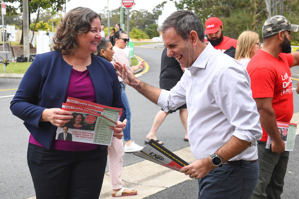 Labor’s Letitia Del Fabbro and Treasurer Jim Chalmers talk at Arundel State School during polling day for the Fadden byelection.
