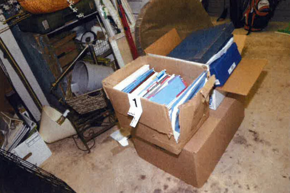 This photo, included in Special Counsel Robert Hoare's report, shows a damaged box in which classified documents were found in Biden's garage. 