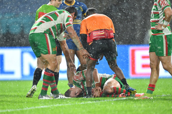Liam Knight lies on the turf after being injured by a cannonball tackle against Parramatta.