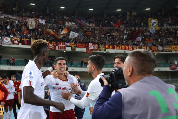 Cristian Volpato celebrates his goal for AS Roma in front of the away support section at the Bentegodi.