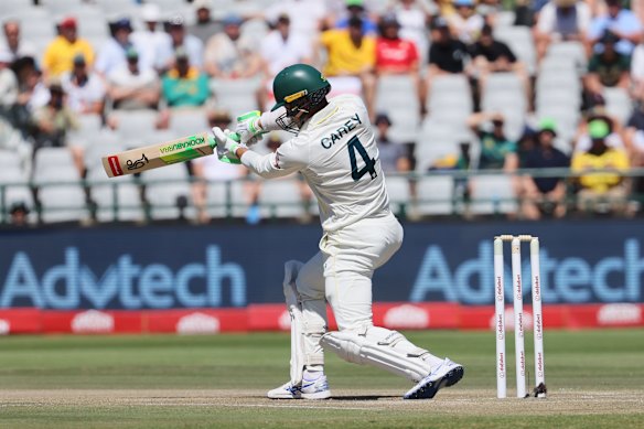 Australia’s Alex Carey plays a shot on day three.