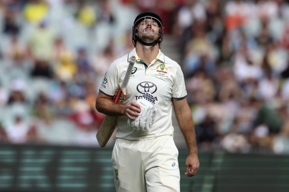 Mitchell Marsh walks off after being caught in the slips for 96.