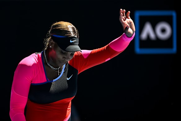 Serena Williams acknowledges the crowd as she leaves the court after her loss to Naomi Osaka.