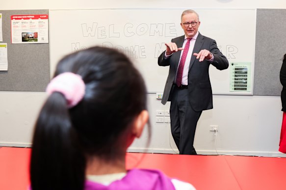 Albanese meets with students during a visit to the New Century Chinese Language School at Wheelers Hill Secondary College in the Victorian seat of Chisholm.