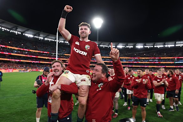 Hugo Keenan is chaired from the field after scoring the winning try.