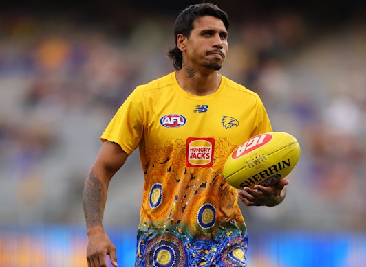 Tim Kelly of the Eagles warms up during the round eight AFL match between West Coast Eagles and Melbourne Demons.