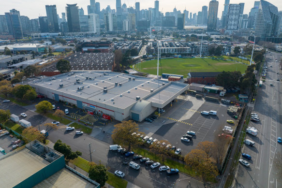 North Port Oval, with the Australia Post warehouse in the foreground, has been bought by the City of Port Phillip.
