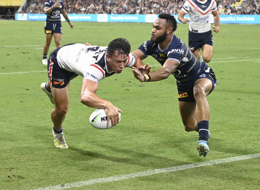 Joseph Manu, who was among the Roosters’ best, crosses for a try on Saturday night.