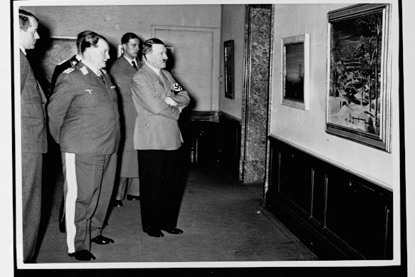 Hermann Goering (centre, left), with Adolf Hitler, amassed a huge art collection, mostly looted from Jewish properties.