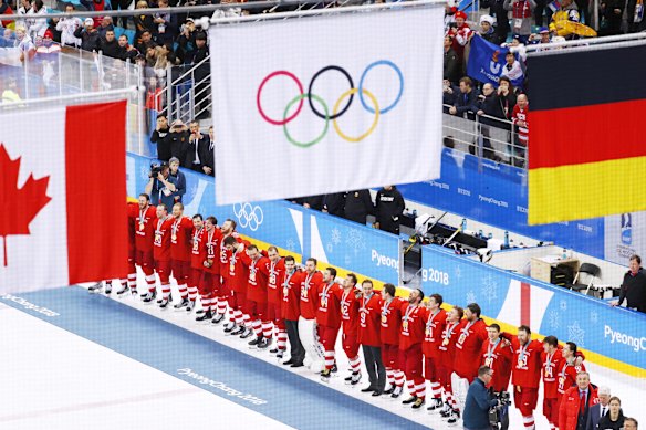 White flag: Russian athletes were forced to celebrate their men's ice hockey gold medal under the Olympic banner at the 2018 Winter Olympic Games.