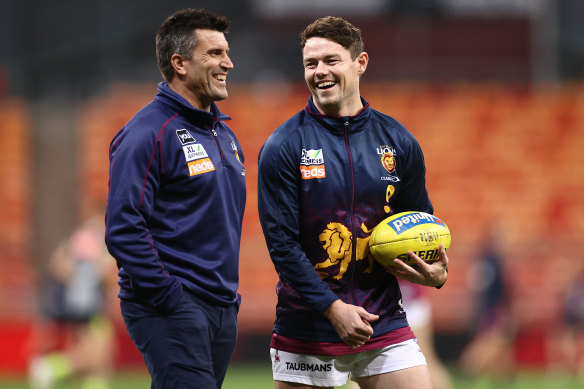 Dale Tapping (pictured with Lachie Neale) worked as an assistant coach at Brisbane Lions before joining Essendon.