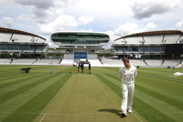 Steve Smith inspects the Lord’s pitch.