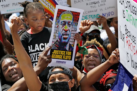 A Black Lives Matter rally in Brooklyn at the weekend. Race and class are inexorably linked in the US.