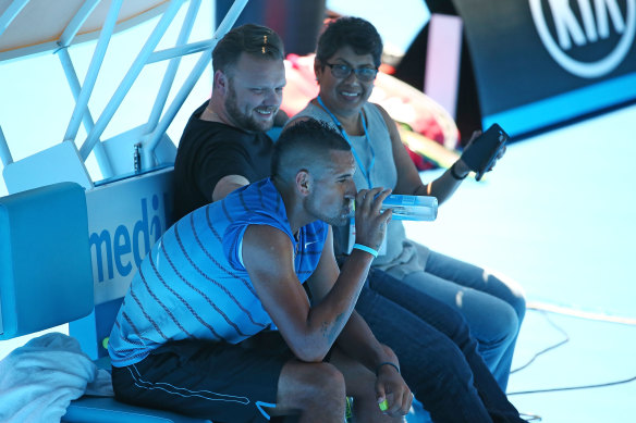 Nick Kyrgios with his former manager John Morris and his mother Nill at the 2016 Australian Open.