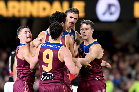 Brisbane Lions star Joe Daniher (middle facing camera). 