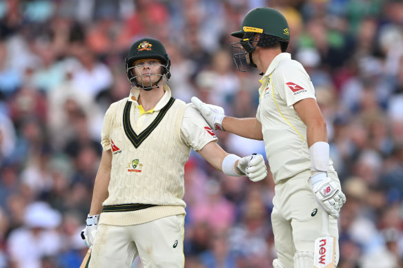 Steve Smith is congratulated after reaching his half century during day two of the Oval Test.