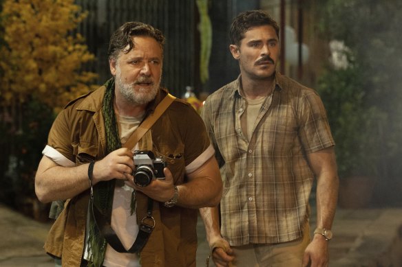 Russell Crowe (left) plays a war photographer opposite Zac Efron’s John “Chickie” Donohue, who travels to Vietnam to deliver beer to his mates in <i>The Greatest Beer Run Ever.