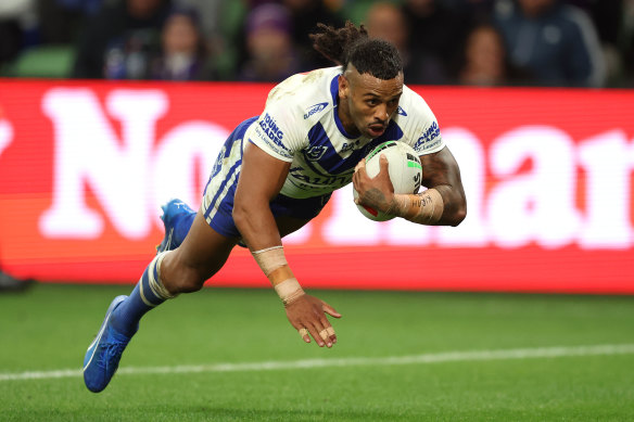 Josh Addo-Carr scores the second of his three tries.