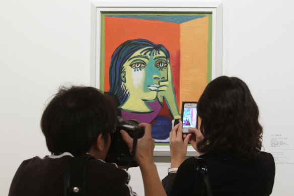 Capturing photographic memories of one of Picasso's portraits of Dora Maar.
