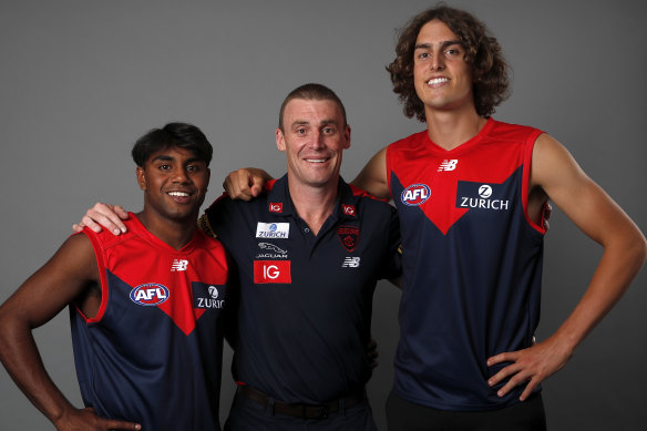 New Demons: Melbourne coach Simon Goodwin with draftees Luke Jackson (right) and Kozzie Pickett. 