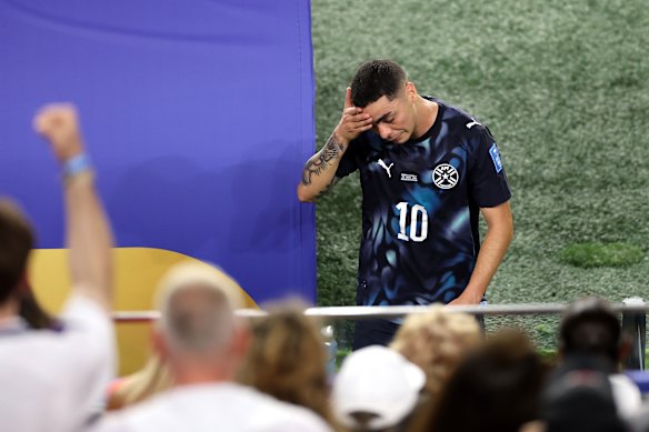 Miguel Almiron leaves the field after his historic red card.