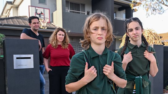 Caroline Baird and Joseph Gallo with their children Jack and Hannah. The family is zoned to their third-closest school.