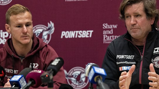 Somewhere over the rainbow ... Manly coach Des Hasler and captain Daly Cherry-Evans sport their sponsor’s logo as they address the media about controversy over the pride jersey.