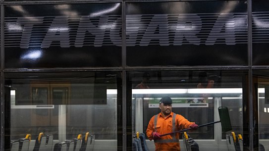 Sydney trains cleaner on a Tangara Train at Mortdale Depot. they are being cleaned and disinfected daily during the COVID-19 Coronavirus epidemic. 