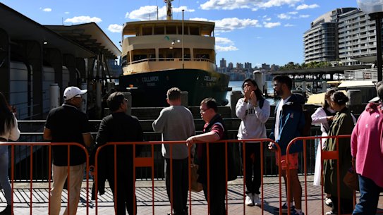 Passengers queue on Sunday at Circular Quay for the Collaroy ferry, whose future remains in doubt.