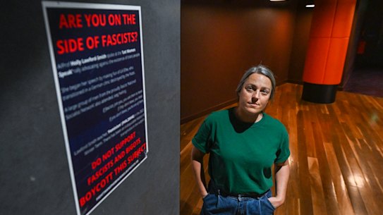 Holly-Lawford Smith with one of the posters urging a boycott of her feminism course.