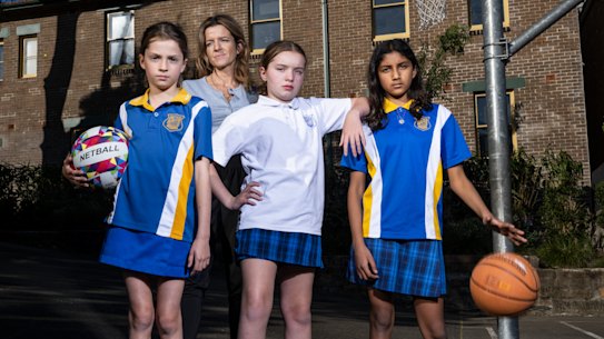 Parent Haylee Kerans (at back of group) with students from Summer Hill Public school.