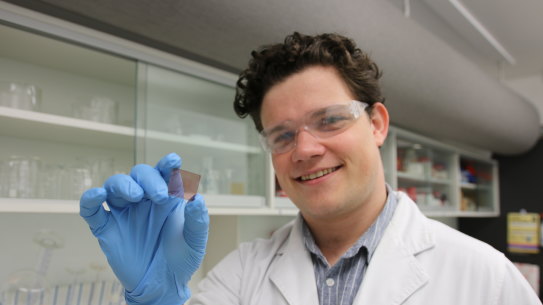 Nathan Brichta who is studying physics at the University of Newcastle where he is helping research and develop an artificial retina that can power itself using light energy instead of running off a battery pack that has to be carried. 