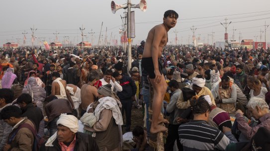 Indian Hindu pilgrims gather at Sangam, the confluence of the rivers Ganges, Yamuna and mythical Saraswati, during the Kumbh Mela festival on Monday.