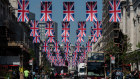 Bunting for the coronation of King Charles III adorns Regent street in central London.