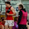 Essendon’s injury woes continued with Nic Martin hobbling from the ground.