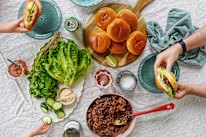 Perfect make-ahead food: DIY pork burgers with red curry and coriander mayo.