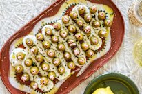 Dirty martini dip and mortadella olives.