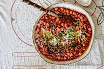 Serve puttanesca chickpeas over pasta to stretch this dish further.