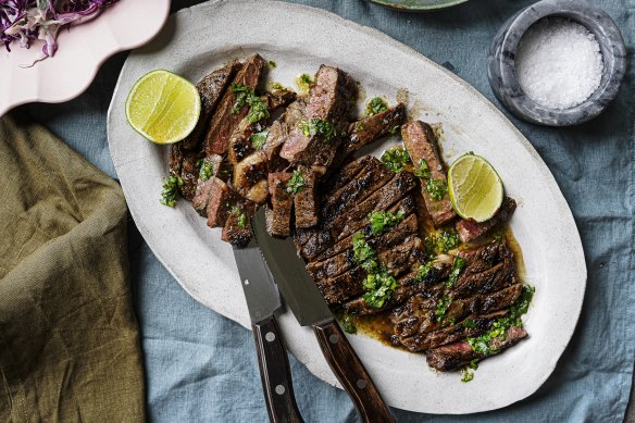 Grilled steak finished with herby lime salsa.