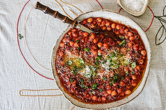 Serve puttanesca chickpeas over pasta to stretch this dish further.