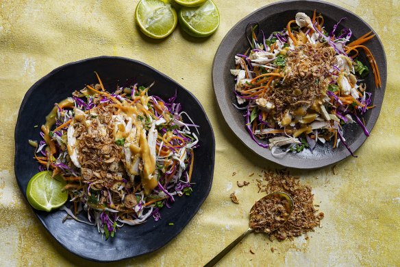 A little chicken goes a long way in this slaw dressed with peanut sauce.