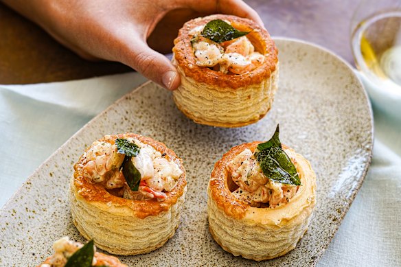 Prawn vol-au-vents with crispy curry leaves.