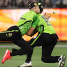 Cameron Bancroft and Daniel Sams of the Thunder collide while attempting to catch the ball during the BBL match between Perth Scorchers and Sydney Thunder.