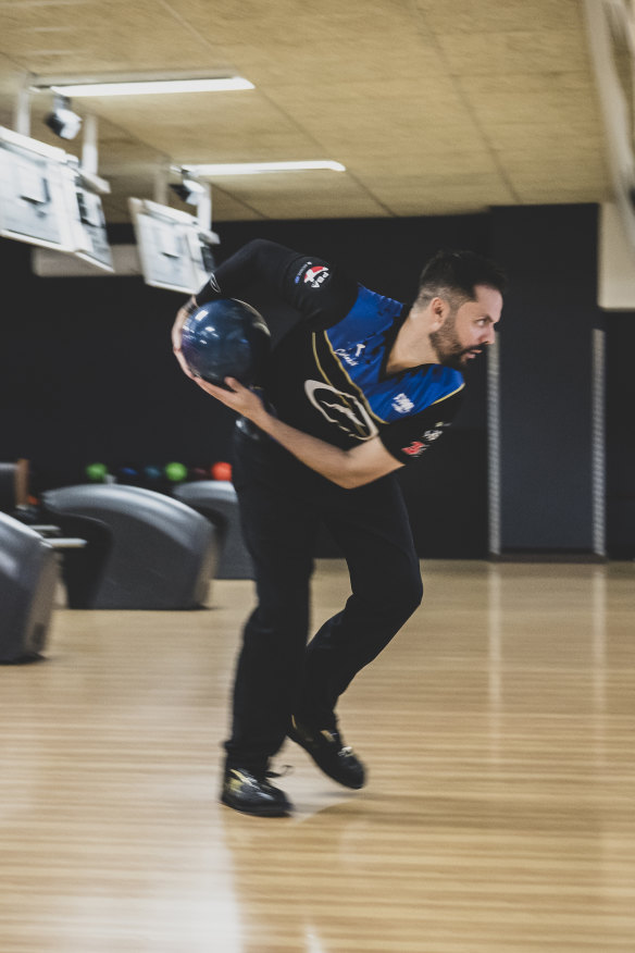 Belmonte demonstrates his two-handed bowling action.