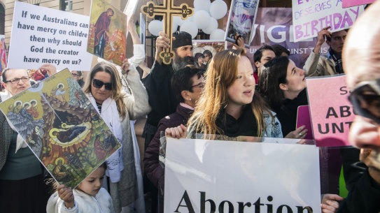 Anti-abortion campaigners protesting outside NSW Parliament on Tuesday.