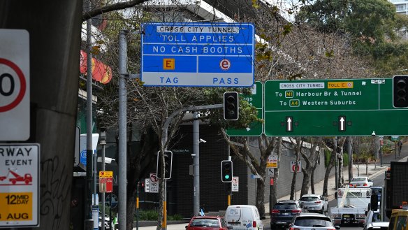Signage informing drivers of tolls on Craigend Street in Rushcutters Bay.