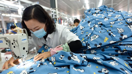 China’s manufacturing activity continues to grow but at a slower pace.
